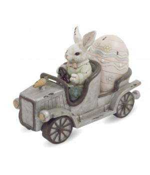 Фигурка " Кролик в машине с пасхальным яйцом". Размер: 15x20x9см